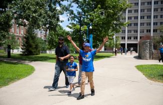 Family on campus walking