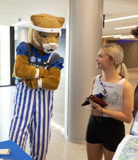 Wildcat with Student at orientation