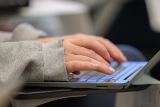 student working on laptop