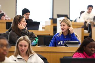 Girls collaborating in class