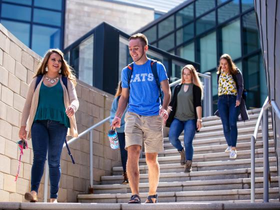 Students descend the steps at the Gatton Student Center