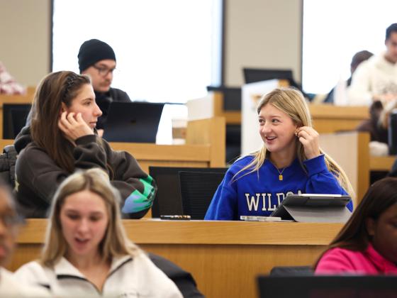 Girls collaborating in class